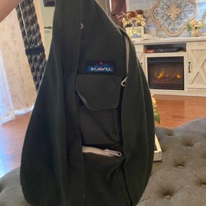 Kavu dark green sling rope backpack with white zippers